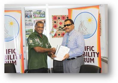 Dr. Jimmie Rodgers, SPC Director-General, and Mr. Setareki Macanawai, Chief Executive Officer, Pacific Disability Forum