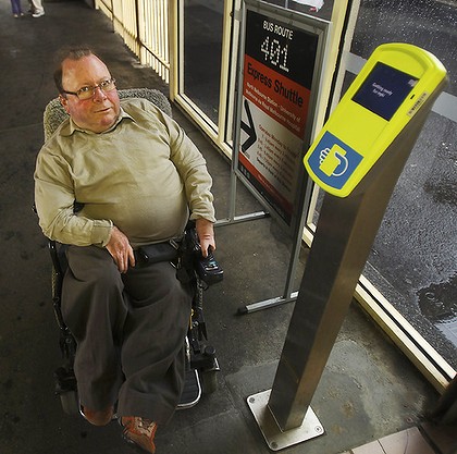 The new myki scanners are higher than Metcard validators. Photo: Ken Irwin